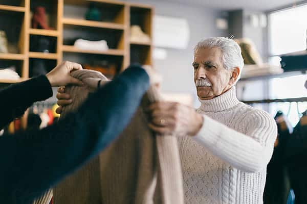 elderly man trying clothes fun activities for seniors